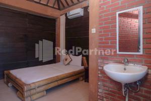 Kebon Krapyak Cottage Syariah Mitra RedDoorz near Stadion Maguwoharjo