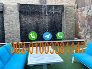 Trio villa with falls in compound فلا بحديقة كبيره وشلالات صناعية - Sheikh Zayed