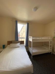 Family Room (2 Adults + 2 Children) room in South Beach Promenade Bed & Breakfast