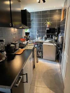 Appartements Appart Leonard - Loger a cote de Paris et Disneyland : photos des chambres
