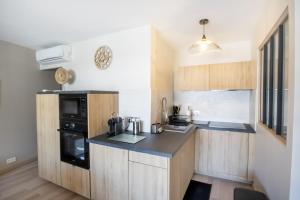 Confort du Sud T2 avec garage et WiFi en centre-ville