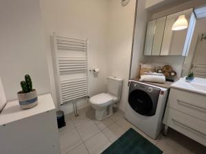 Appartements Charmant studio a 7 min de Disney : photos des chambres