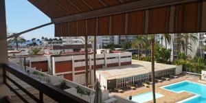 Top-Apartment in Apartamentos Danubio, 4 Etage, Poolblick und seitlicher Meerblick, Wohnzimmer und 1 Schlafzimmer, im Herzen von Playa del Inglés , Gran Canaria