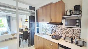 CityCondo, 2nd Fl, 30 sqm, near CPU, balcony and parkview, Netflix, free parking