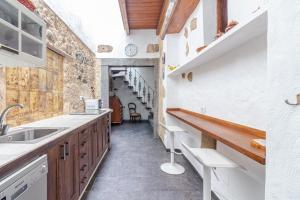 Amiga Mia Traditional House