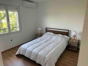 Maisons de vacances Maison 100m2 4 chambres avec piscine jardin paysage : photos des chambres