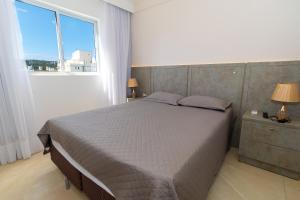 115E - Luxuoso 2 quartos em condomínio fechado em Bombas