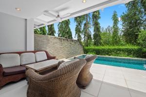4 bedrooms & bathroom for up to 12 guests 7kms to Patong beach at The Fairways golf villas