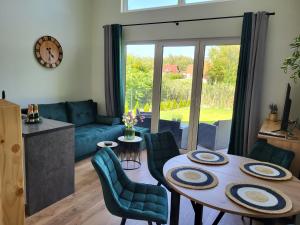 Zielona Ostoja - domek z prywatnym pomostem przy Obrzycy