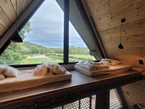 Chalets Les Deltas du Lac : photos des chambres
