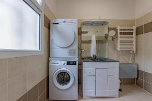 Appartements Quercy Blanc coeur de village parking facile : photos des chambres
