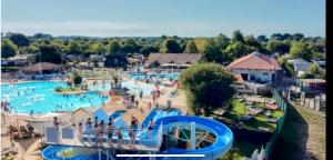 Grand mobil-home 4 chambres clim - 10 places - Océan - Plage accès direct Siblu