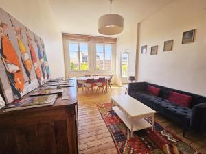 Appartements Le Bienheureux, le calme en ville et jardin : photos des chambres