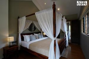 StayVistas Skylight Serenity with Modern Interiors, Outdoor Pool, Poolside Gazebo, Manicured Lawn