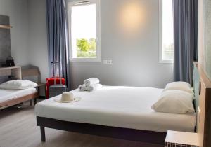 Hotels ibis budget Lunel Porte de Camargue : photos des chambres