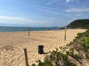 Casa pé na areia em praia paradisíaca