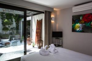 B&B / Chambres d'hotes Be Loft B&B Pool & Spa : photos des chambres