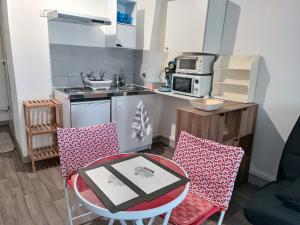 Appartements Logement 1 : photos des chambres