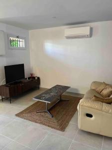 Appartements Joli T3 dans villa avec jardin et parking : photos des chambres