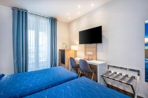 Hotels Hotel Terminus Montparnasse : photos des chambres