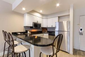 Three-Room Queen Suite with Two Queen Beds and Sofa Bed room in Post 1429 Phoenix Tempe ASU