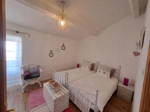 Maisons de vacances Le Cottage de Sainte Valiere (Jacuzzi et terrasse ) : photos des chambres