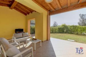 DesenzanoLoft Official Partner MARRIOTT Homes & Villas - Oasis Apartment with garden and pool