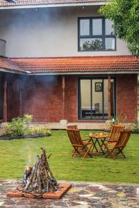 SaffronStays Amavi - 4BHK Villa in Dapoli with Lawn & Tropical Garden, Perfect for Family Celebrations