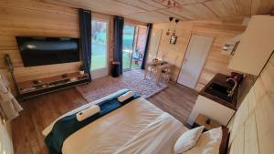 B&B / Chambres d'hotes Chalet avec bain nordique : photos des chambres