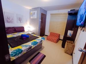 UNOS Place with Karaoke,Wifi,Netflix and Balcony