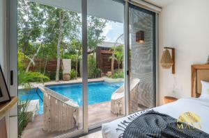 NHOA 107A Lux 2BR Condo Pool access in Aldea Zama