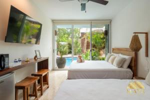 NHOA 107C Lux 1BR Condo Pool access in Aldea Zama