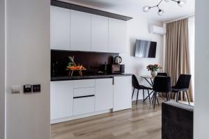 Quadruple Room with Balcony room in Arena Apart - Hotel