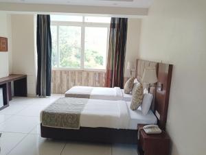 Manuni Inn - Riverside Resort