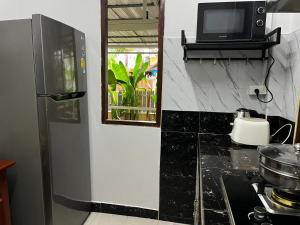 2BR Maryam villa near Tesco & beach.