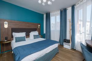 Hotels The Originals Boutique, Hotel Le Marignan,Le Havre Centre Gare : photos des chambres