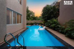 StayVistas Rosso with Outdoor Pool, Theatre-Disc Room & Games Room