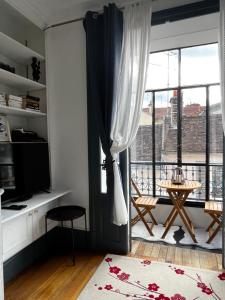 Appartements superbe appartement belifontain coeur de ville : photos des chambres