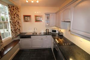 Old Bakers Cottage ground floor apartment centrally located in Grasmere with patio area