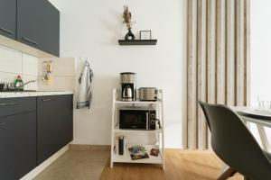 RAUM921 - Stilvolles Apartment - WLAN, Tiefgarage, Küche, Netflix