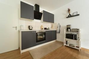 RAUM921 - Stilvolles Apartment - WLAN, Tiefgarage, Küche, Netflix