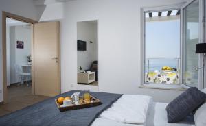 One-Bedroom Apartment with Balcony and Sea View room in Comfort Zovko