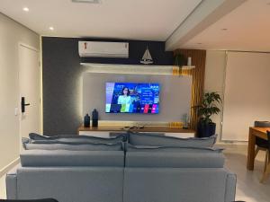 RP Home 113- O seu lindo apartamento na praia do Guarujá