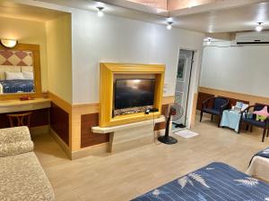 Phòng Bốn Người Có Phòng Tắm Riêng (Quadruple Room with Private Bathroom)