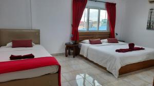 Happy Beach Jomtien Guesthouse