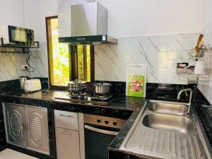 2BR Maryam villa near Tesco & beach.