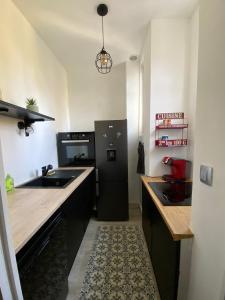 Grand deux pièces au pied du parc du château
