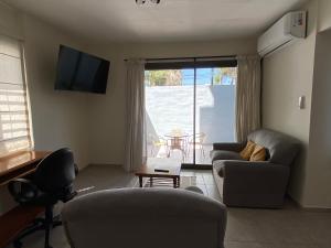 Excepcional apartamento, con patio cochera y parrilla en el centro