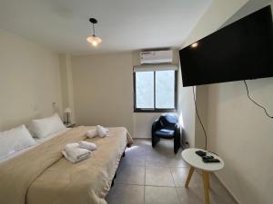 Excepcional apartamento, con patio cochera y parrilla en el centro