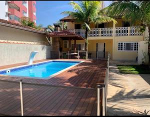 ALUGA-Se CASA CONFORTÁVEL COM PISCINA